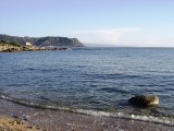 Capu Neru depuis la plage de l'Olivu